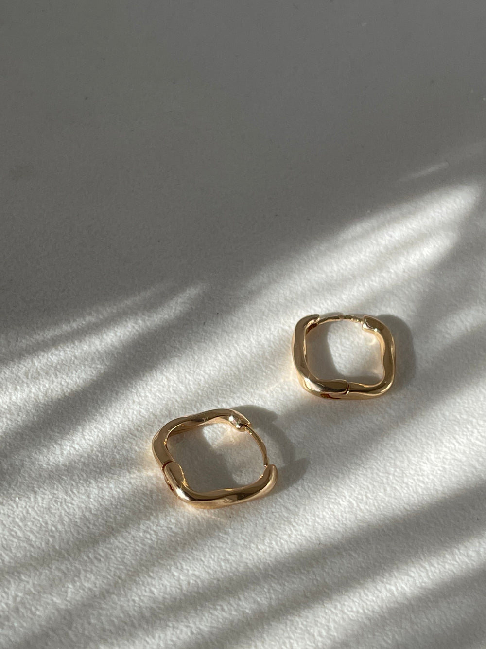 Kirsten Twist Stainless Steel Hug Hoop Earring In Gold
