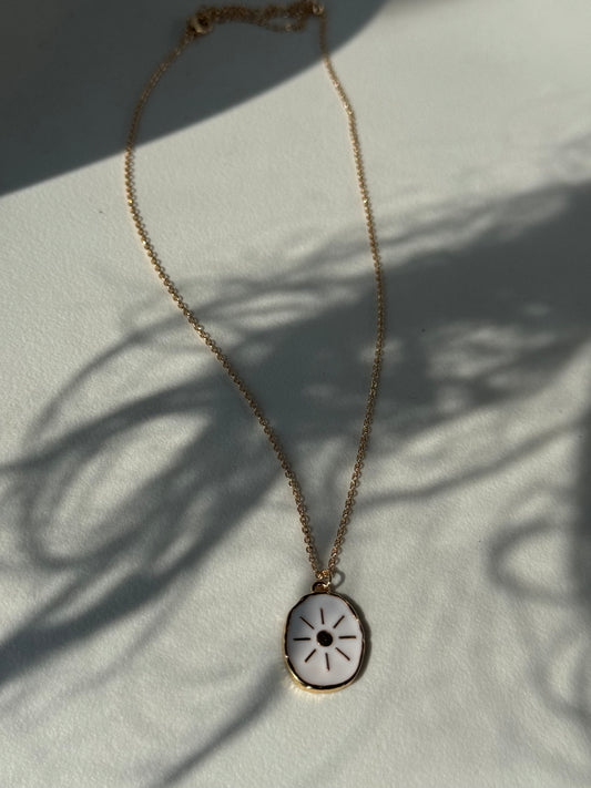 Organic Gold Rim Texas Sun Necklace In Ivory Gold