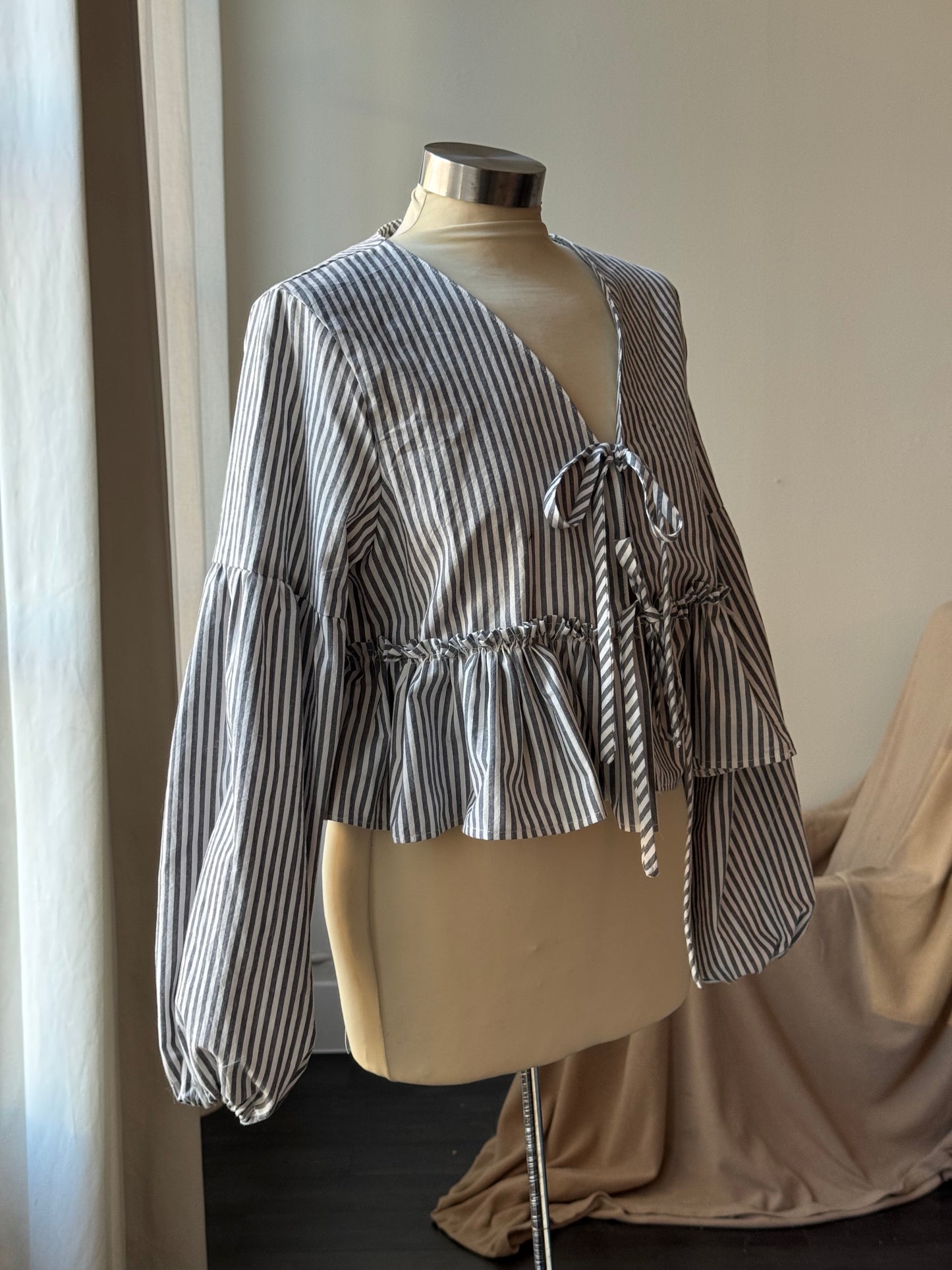 Florene Vintage Lantern Sleeve Ruffle Tie Front Top