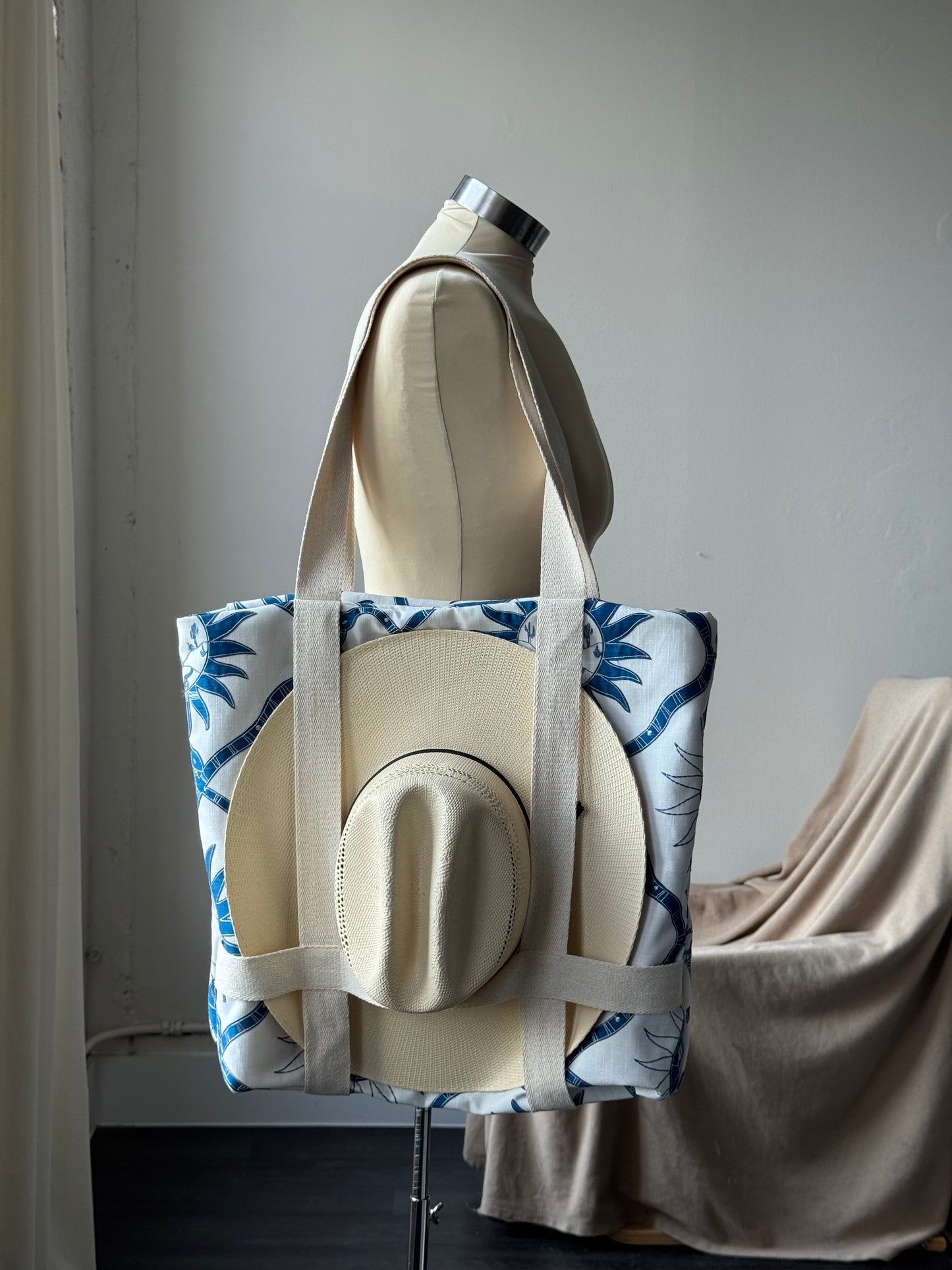 Magnus Handcrafted Cotton Tote Hat Holder Bag In Embroidered Canvas