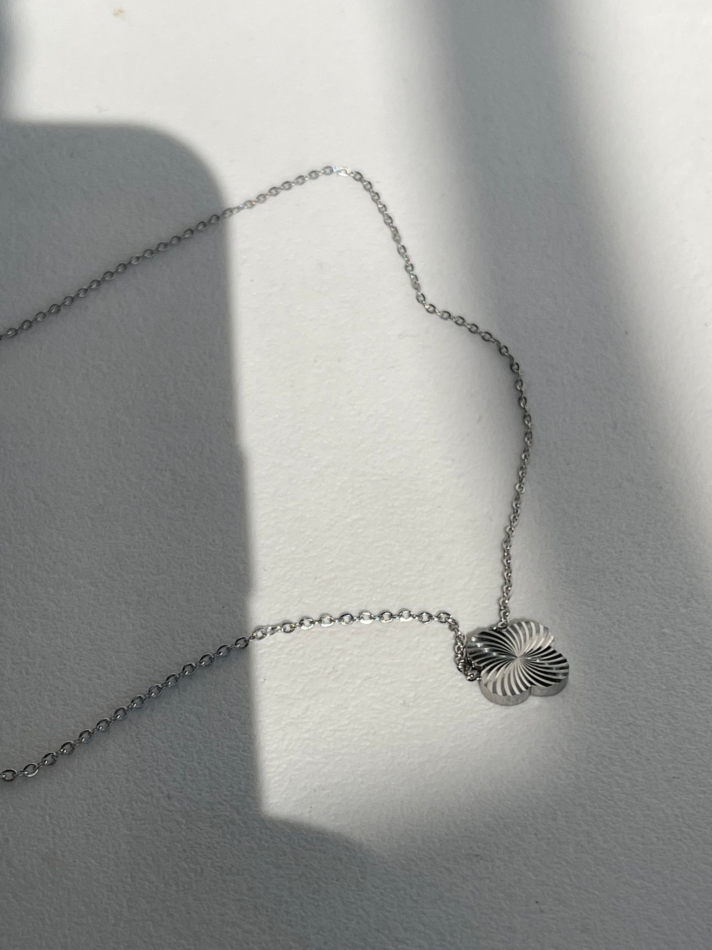 Dixon Stainless Steel Clover Spiral Necklace In Silver