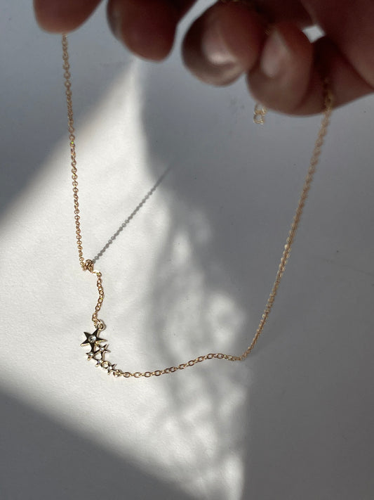 Galaxy Star Dust Charm Necklace In Gold