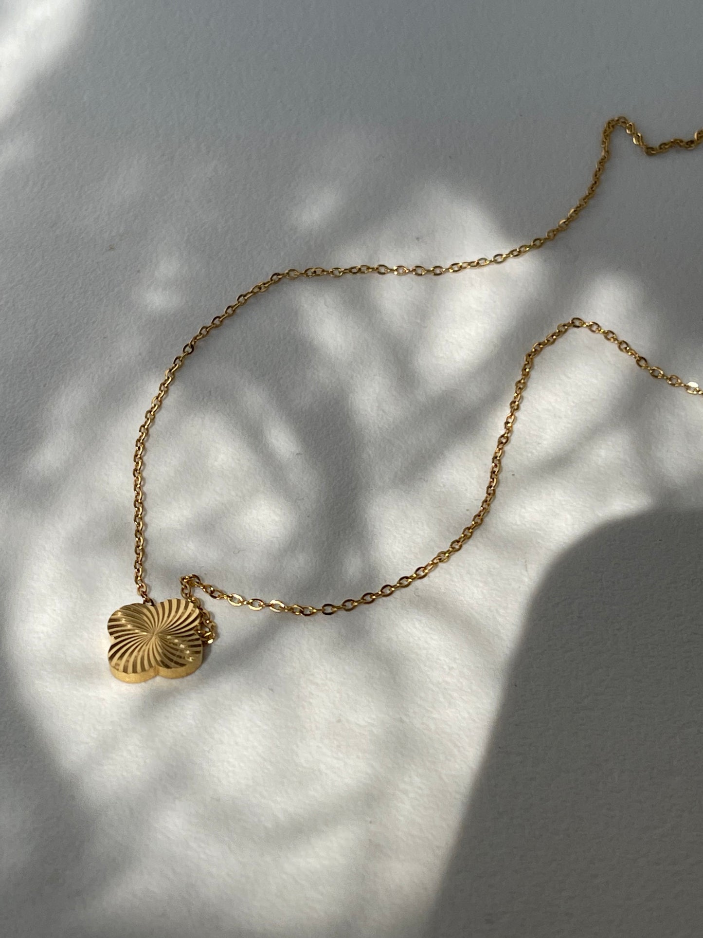 Dixon Stainless Steel Clover Spiral Necklace In Gold