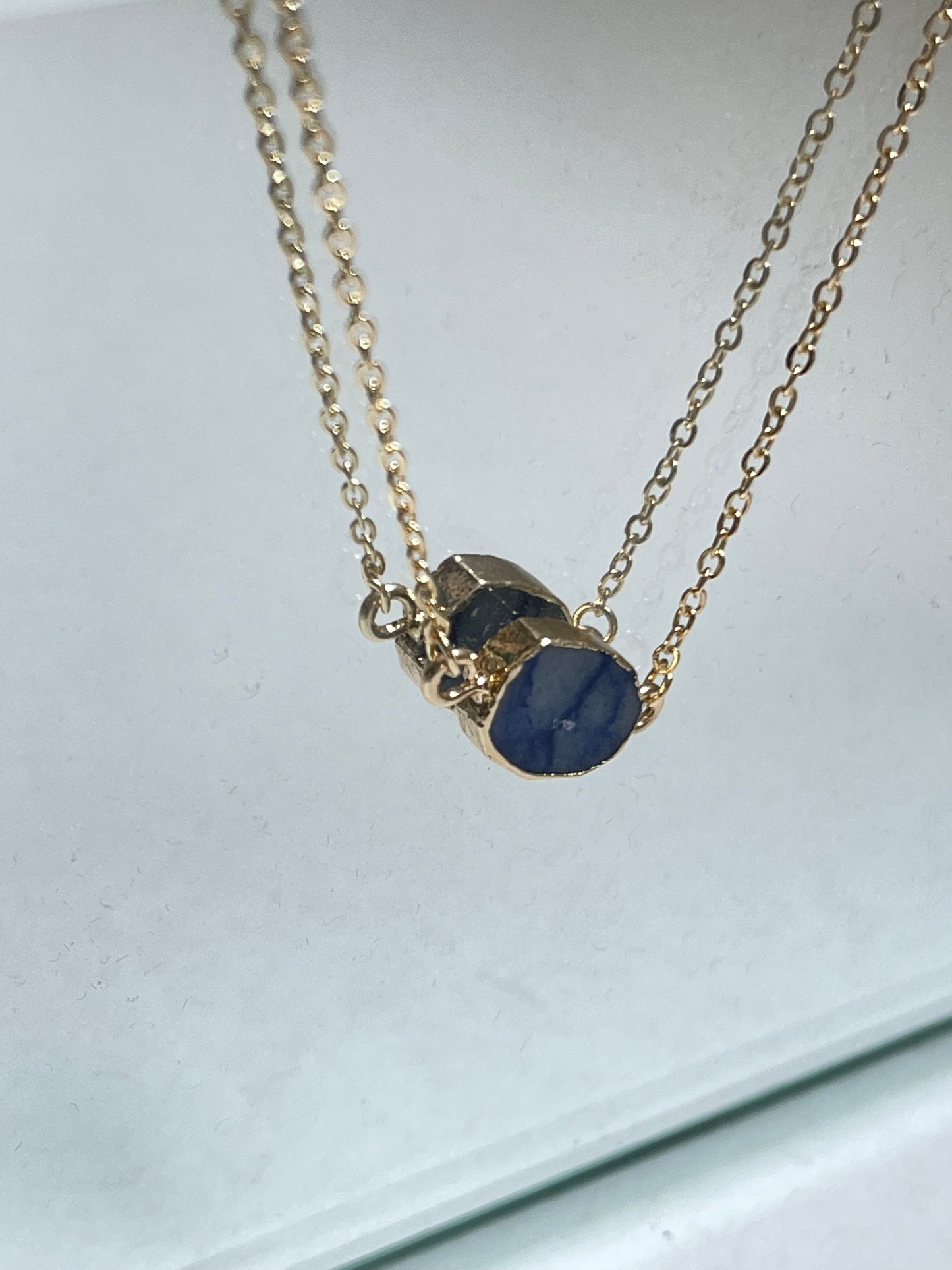 Organic Gold Rim Stone Charm Necklace In Blue