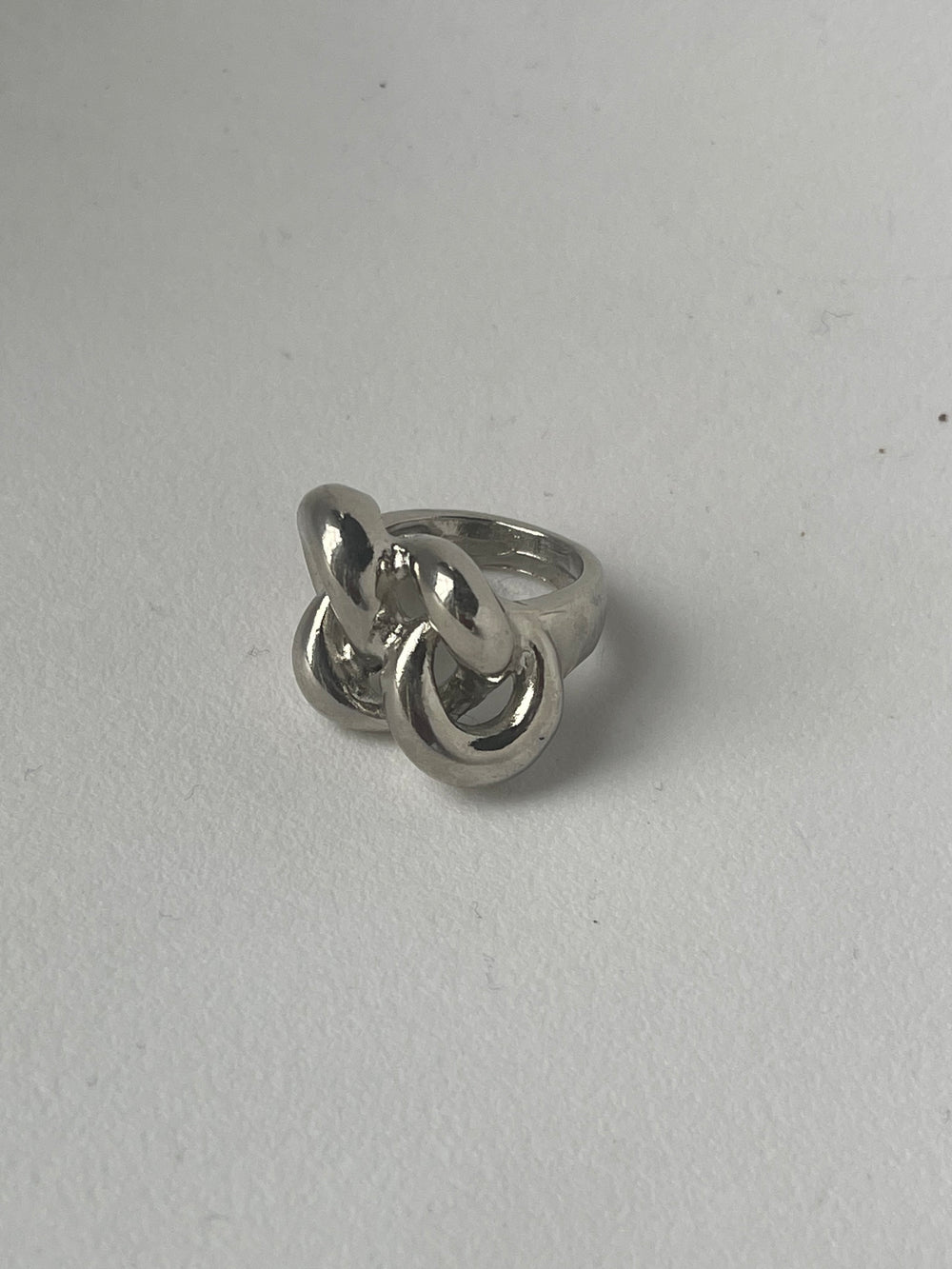 Claudette Twist Front Statement Ring In Silver