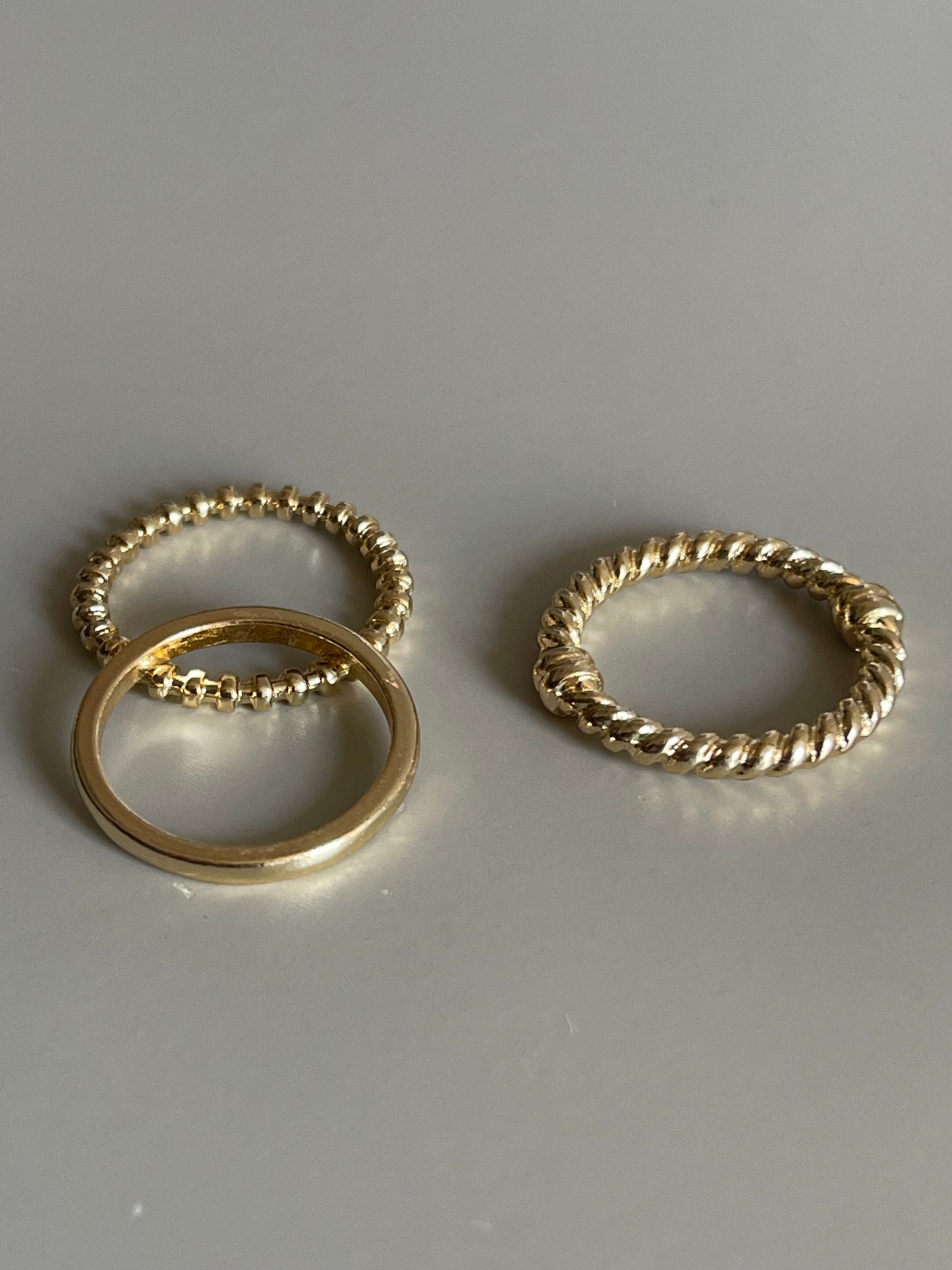 Tri Knot Twist & Band Ring Set In Gold