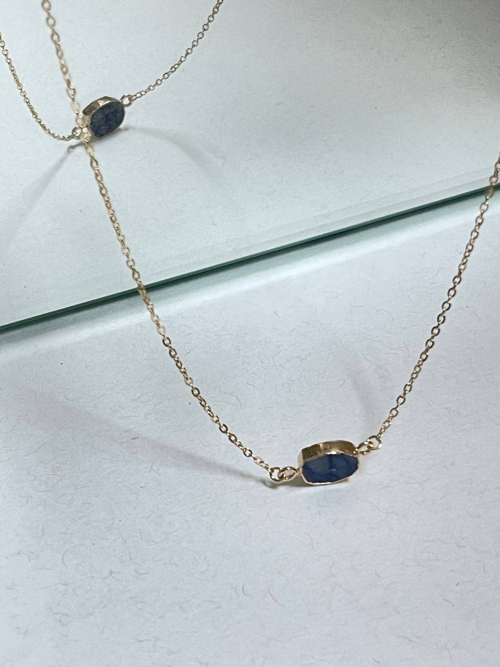 Organic Gold Rim Stone Charm Necklace In Blue