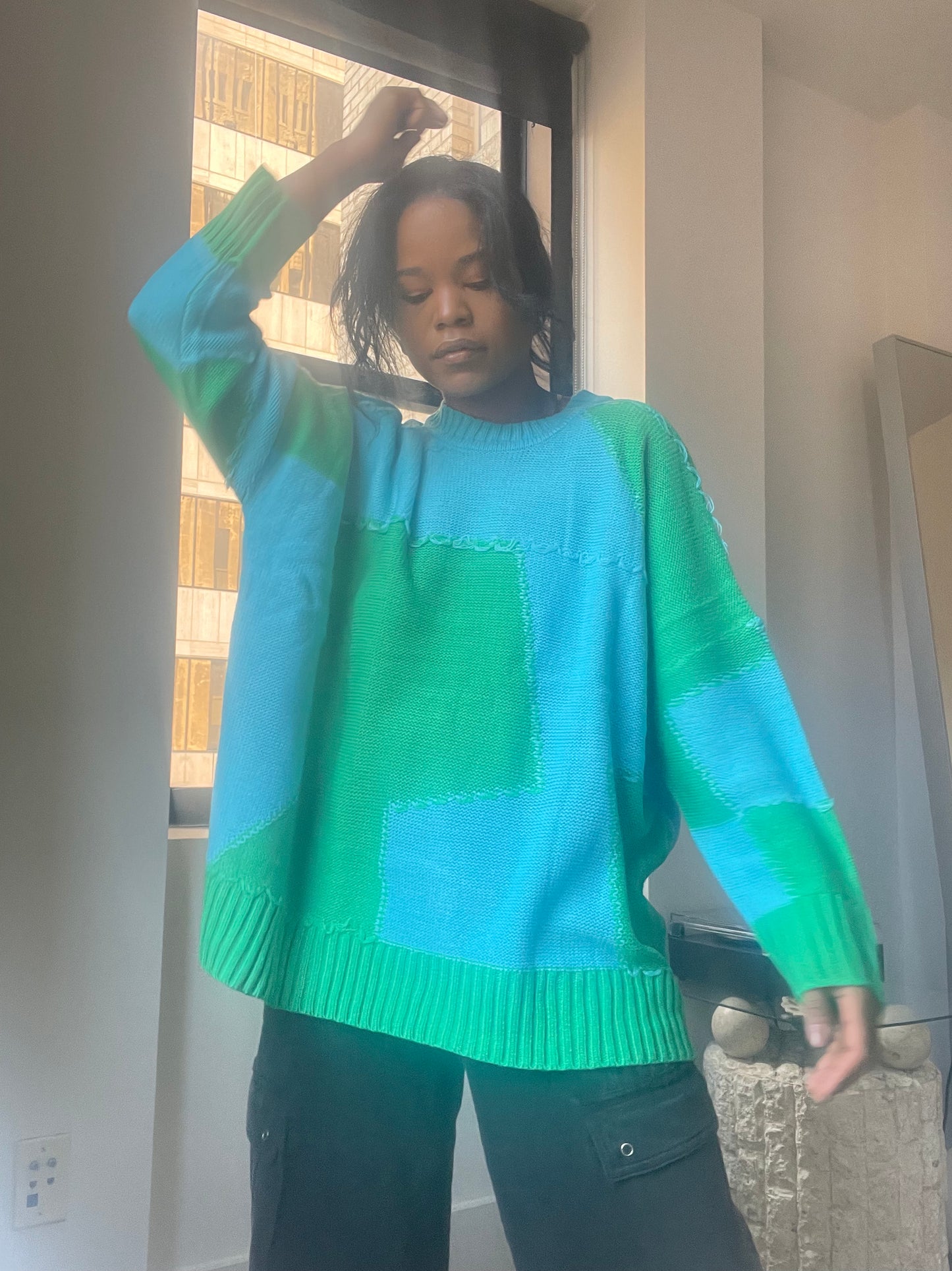 Nico Distressed Color Block Sweater In Teal Green
