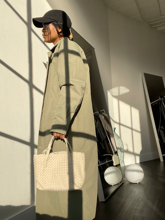 Marge Vegan Leather Woven Makeup Bag In Cream