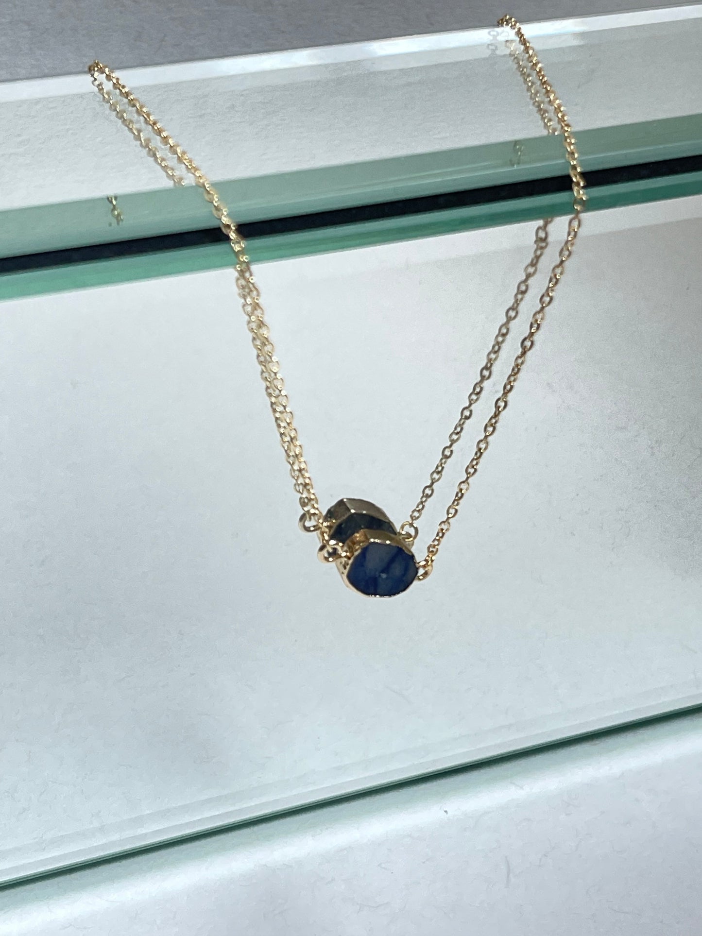 Organic Gold Rim Stone Charm Necklace In Blue