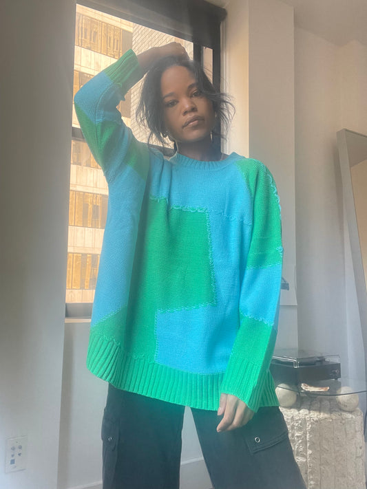 Nico Distressed Color Block Sweater In Teal Green