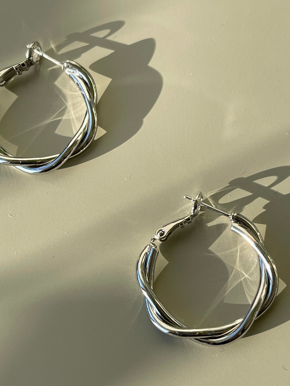 Loose Twist Simi Mini Hoops In Silver