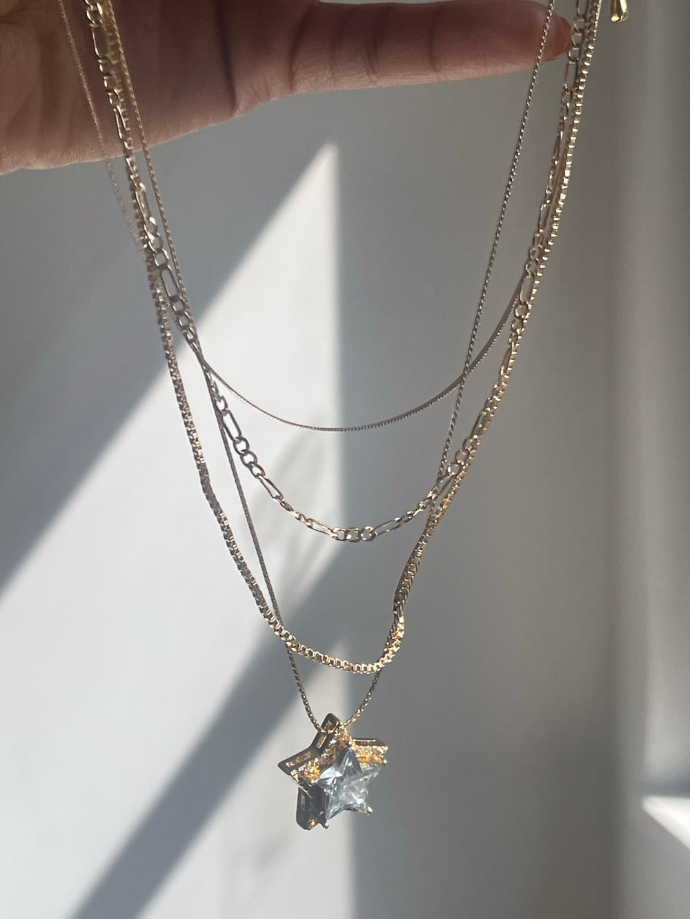 Assorted Layered Star Drop Necklace In Gold