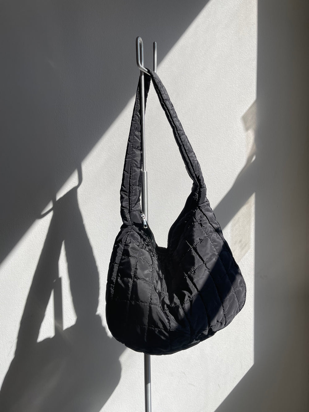 Claudia Quilted Puffer Hobo Lounge Bag In Black