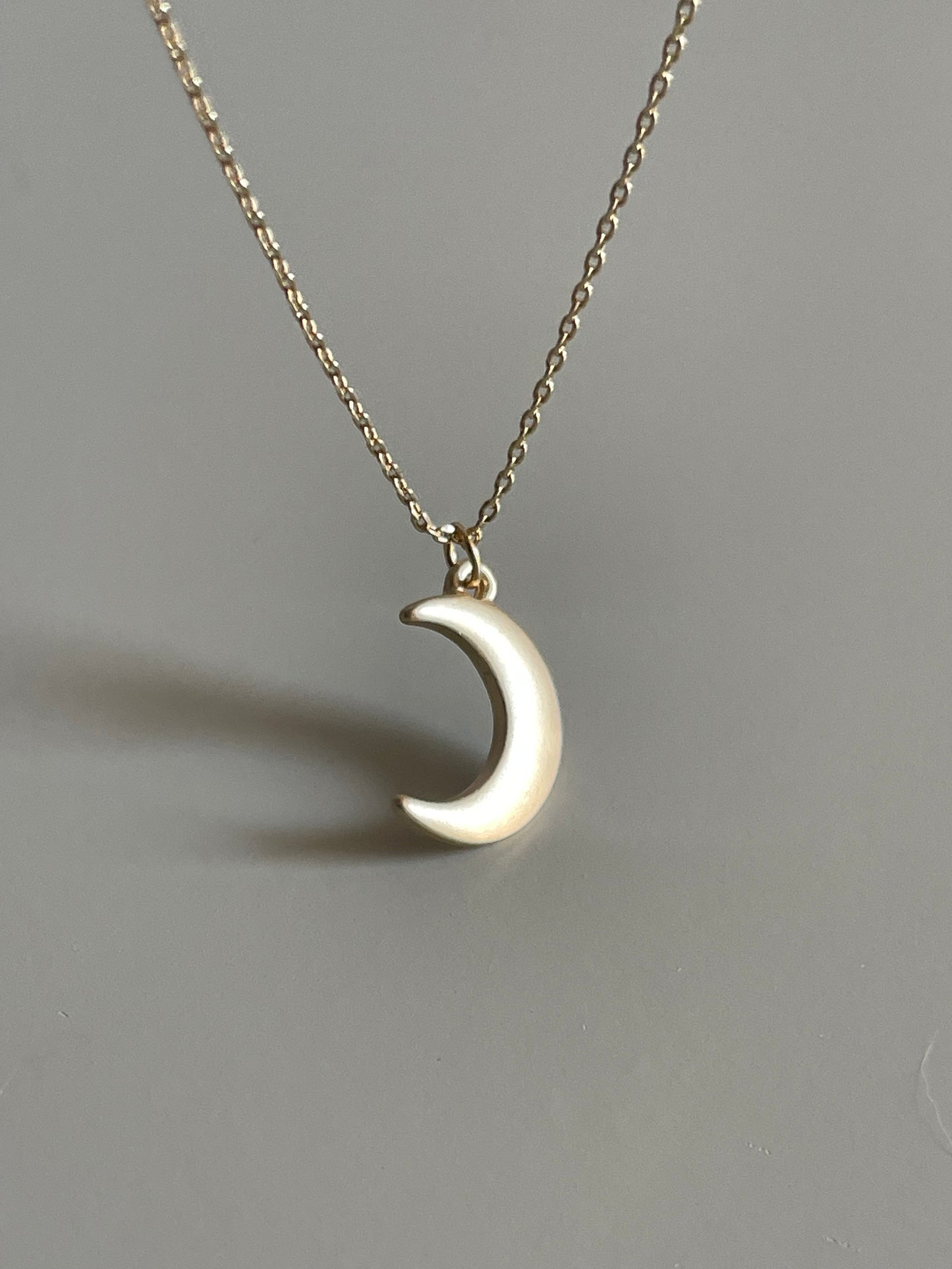 Single Charm Crescent Moon Necklace In Matte Gold